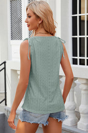 Sage eyelet tank top with tie shoulder straps and square neckline.