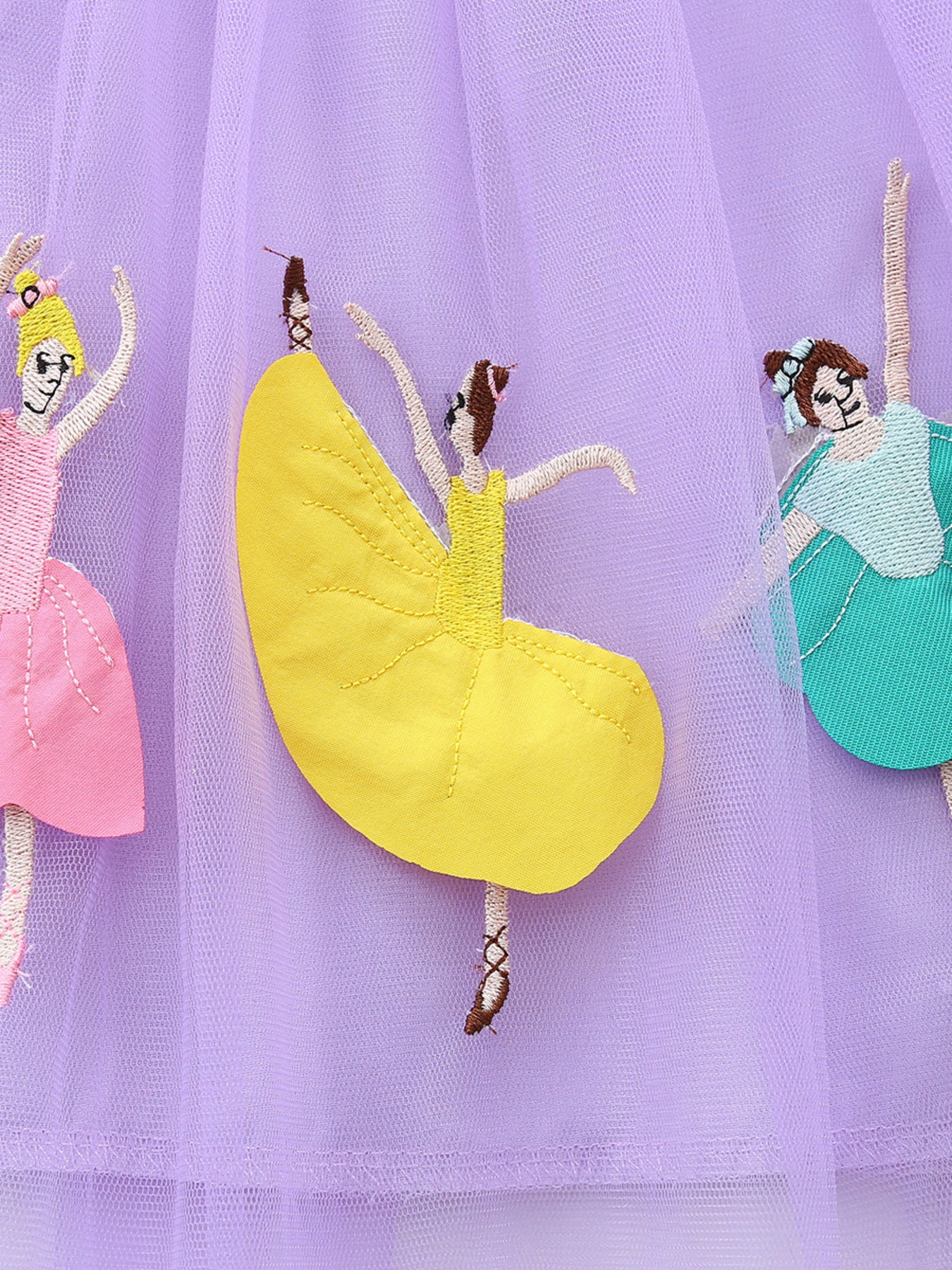 Lavender tulle dress with embroidered ballerinas in pink, yellow, and teal.