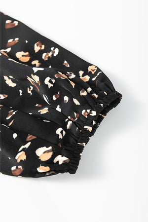 Black abstract print blouse with elasticated cuffs and gathered sleeve detail