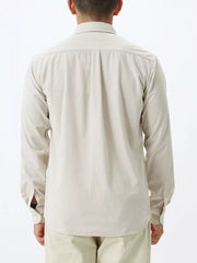 Refined plus size long sleeve shirt in apricot with buttoned cuffs and a classic collar.