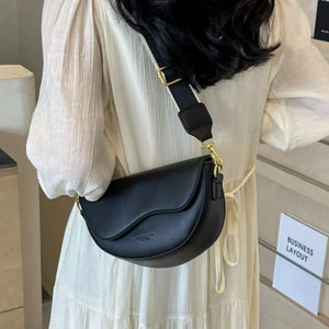 Leather Crescent Crossbody Bag in Black, model styling view