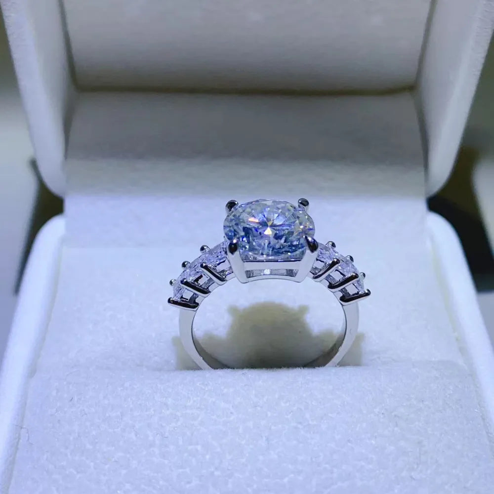 Radiant Round Moissanite & Baguette Ring in silver sterling silver with a large center stone.