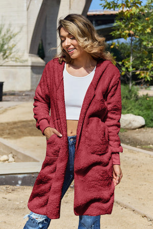 Plush hooded duster in Deep Red with thumbhole cuffs and pockets.