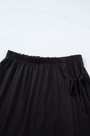 Black tie-wrap two-piece ensemble with elastic waistband and drawstring detail