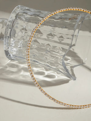 Gold diamond row collar necklace with 18K gold finish.
