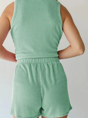 Sleeveless ribbed coord set in Gum Leaf green with elastic waistband shorts.