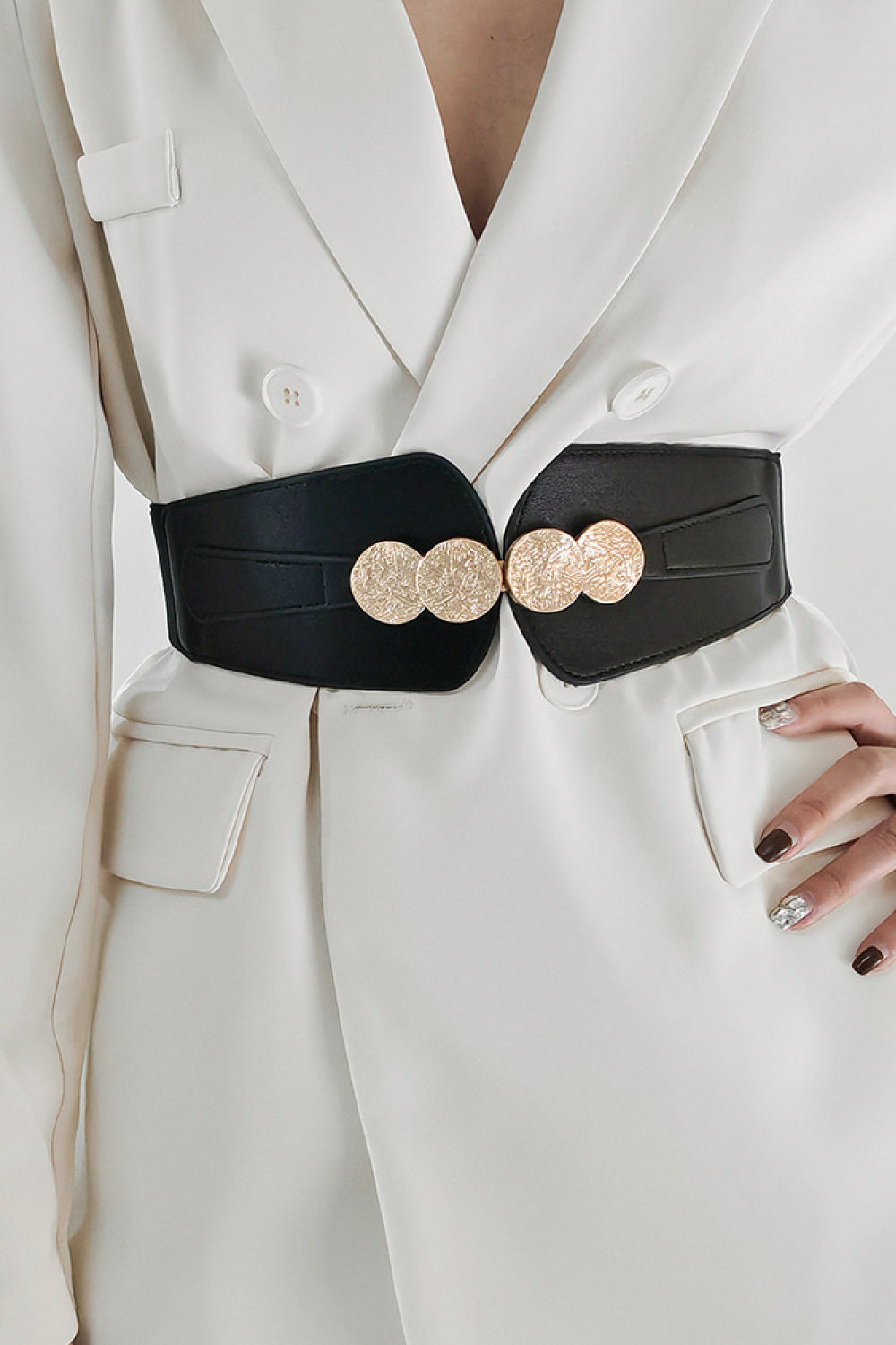 Black elastic belt with embossed gold clasp detail