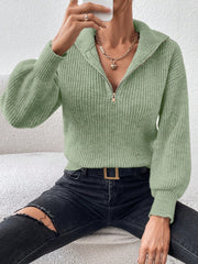 Matcha green ribbed zip-up sweater with a tall collar and balloon sleeves.
