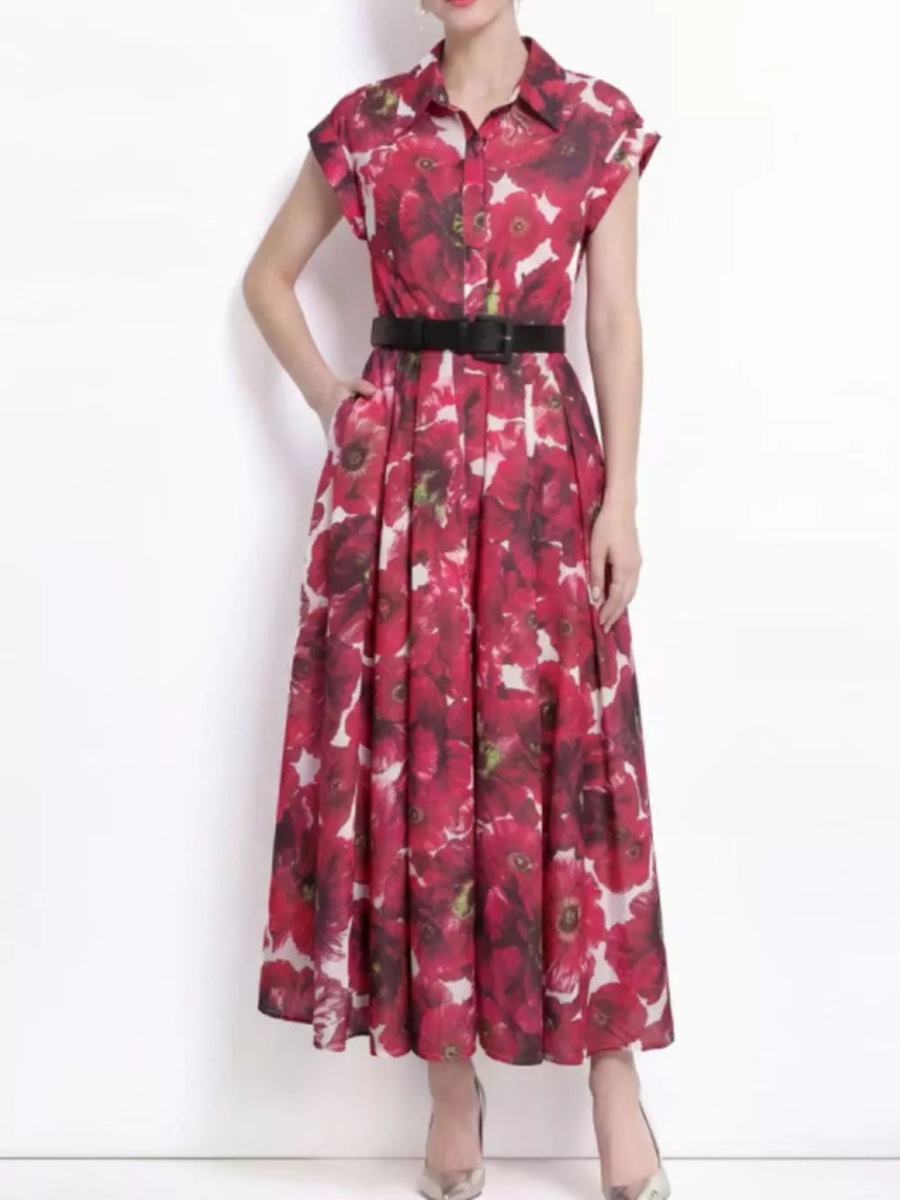 Red botanical print collared midi dress with button-down front and black belt.
