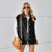 Black denim utility vest with button front and chest pockets