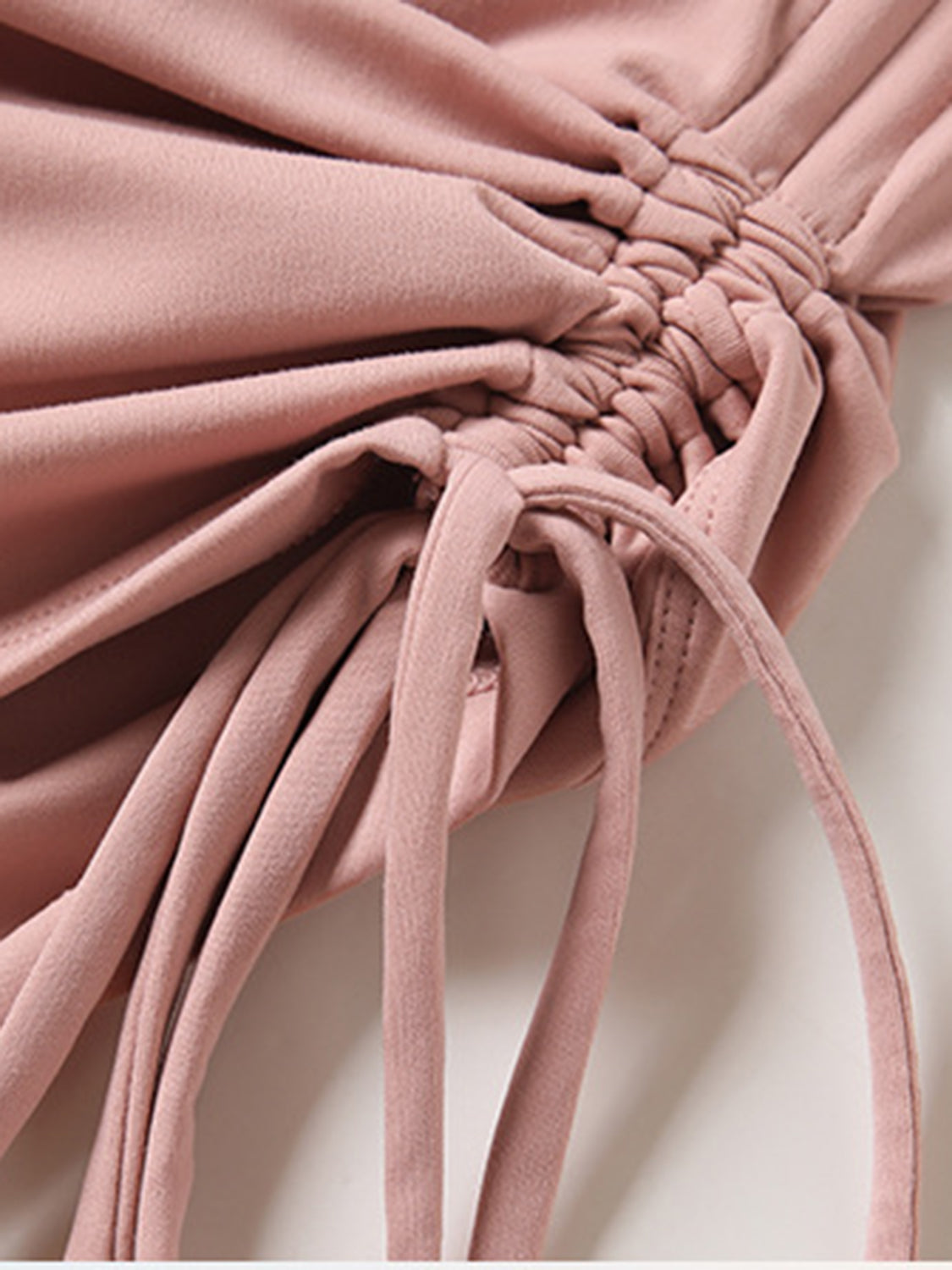 Dusty Pink jersey top with ruched detail and adjustable side ties.