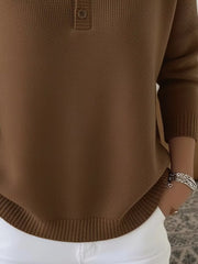 Brown long-sleeve knit top with button detail and ribbed hem
