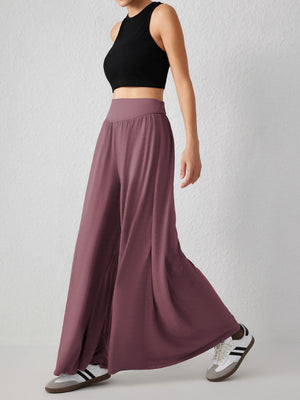 Drape-front wide-leg jersey trousers in Moonlit Mauve with a high waist.