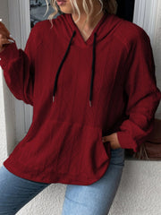Burgundy textured knit raglan hoodie with drawstring and kangaroo pocket.