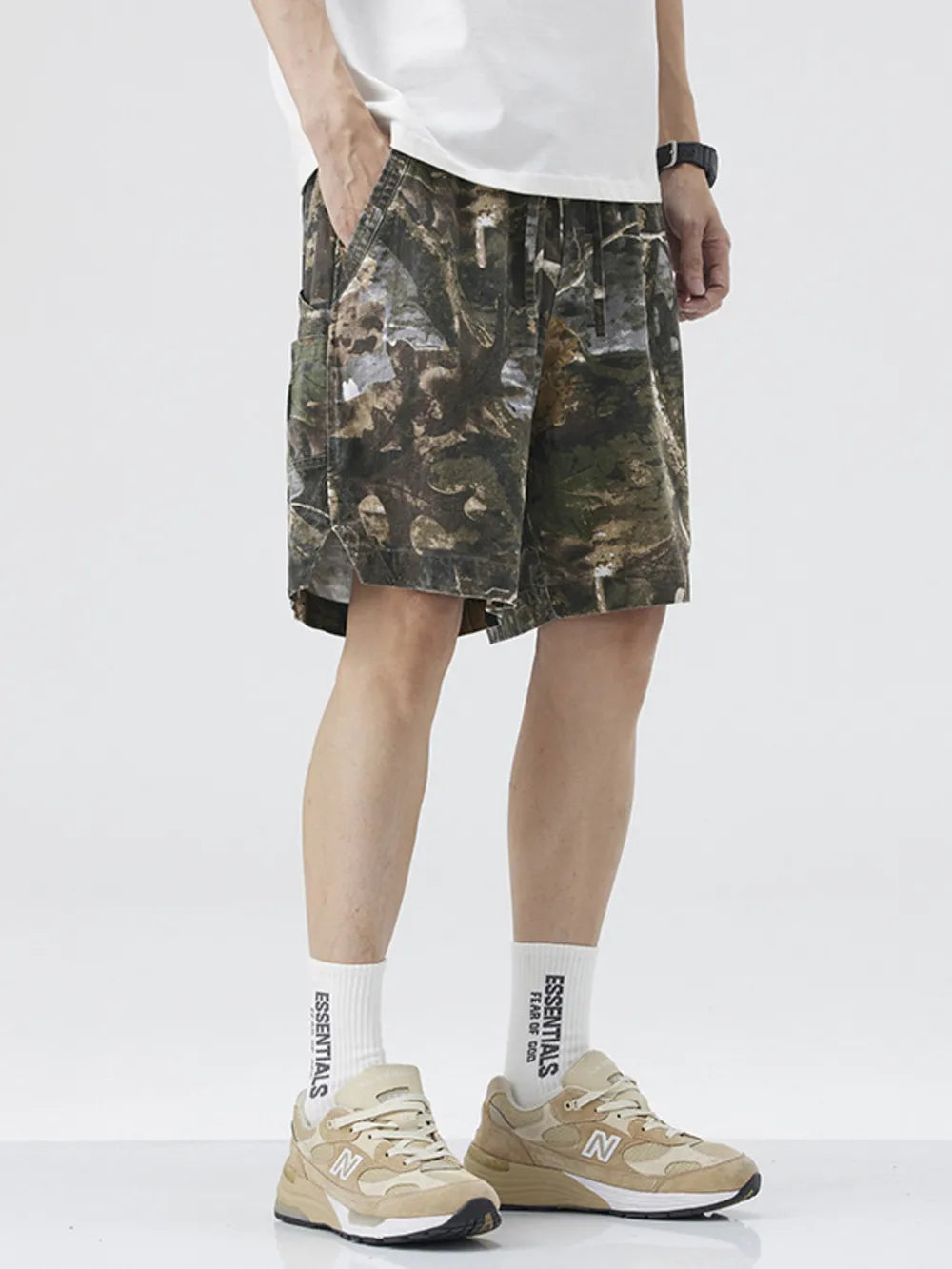 Men's camouflage trunks in Black Forest pattern with drawstring waist and side pockets.