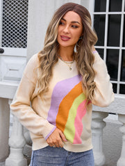 Apricot crewneck knit sweater with colorful wave pattern, acrylic blend.