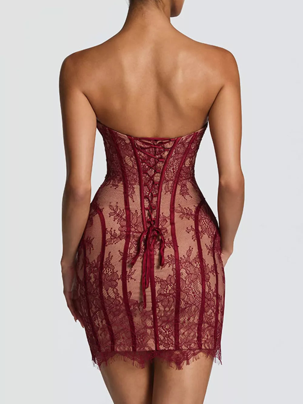 Burgundy lace overlay strapless mini dress with corset back detail