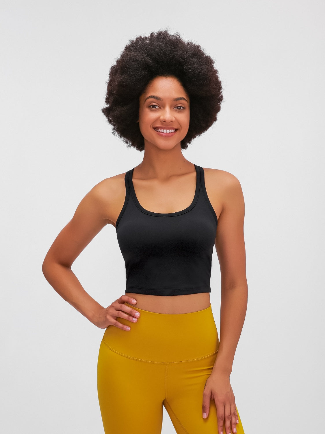 Black sculpted racerback crop tank top with a scoop neckline.