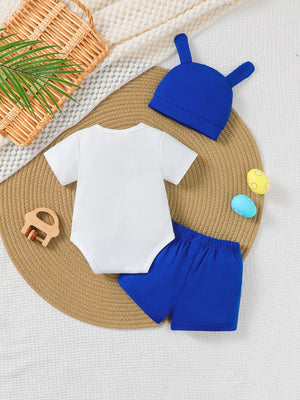 Baby Easter outfit: white bodysuit, blue shorts, and bunny ear hat.