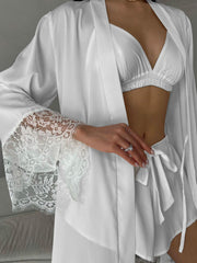 White lace trim three-piece loungewear set with robe, bralette, and drawstring shorts.