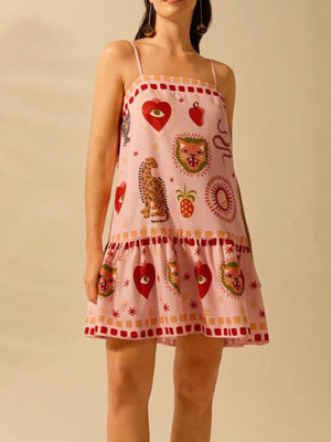 Pink mini dress with eclectic animal and heart print, ruffled hem, and square neckline.