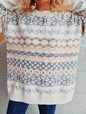Fair Isle knit oversized sweater in white with grey and peach geometric patterns.