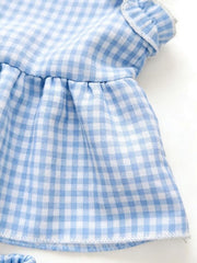 Children's light blue gingham ruffle cotton two-piece set with ruffled trim.