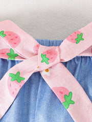 Baby cami set with strawberry print pink bow detail on blue denim shorts.