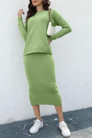 Ribbed knit midi co-ord set in Gum Leaf green acrylic with crew neck sweater and pencil skirt.