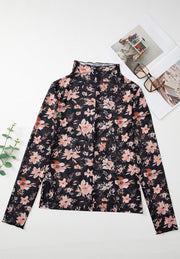 Black sheer floral mock neck long sleeve blouse with lettuce trim.