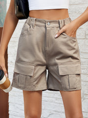 Mocha utility pocket shorts with elasticated waist and cargo pockets, styled casually.