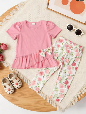 Pink ruffle top with puff sleeves and floral pants set for baby girls.