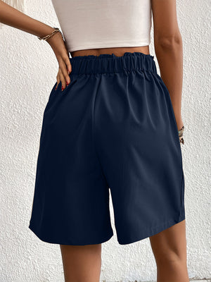 Dark Blue pleated front Bermuda shorts with elastic waist and relaxed fit.