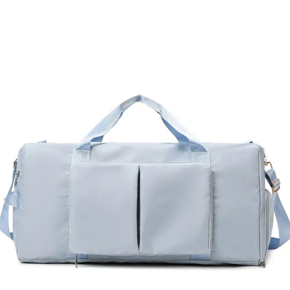 Light Blue Sport Luxe Weekend Holdall duffel bag with front pockets and adjustable strap.