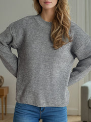 Textured ribbed knit oversized sweater in gray with crew neck and long sleeves.