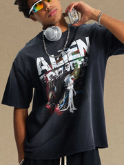 Black oversized tee with a large graphic print featuring aliens and a skeleton.