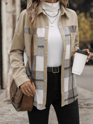 Tan plaid shacket with patch pockets and button front, made of cotton.