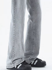 Men's relaxed fit light wash denim jeans with a vintage look.