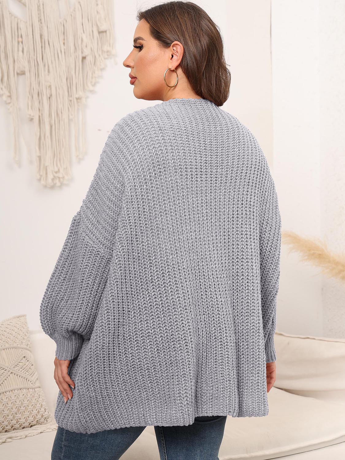 Chunky knit cardigan in Cloudy Blue with balloon sleeves and open front.