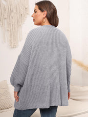 Chunky knit cardigan in Cloudy Blue with balloon sleeves and open front.