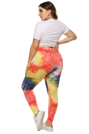 Rainbow tie-dye print full-length leggings with a high waist.