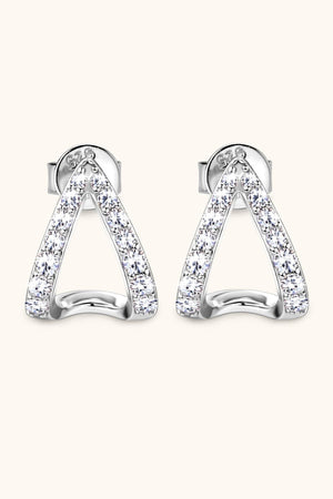 Silver geometric moissanite open-hoop earrings with pavé-set stones.
