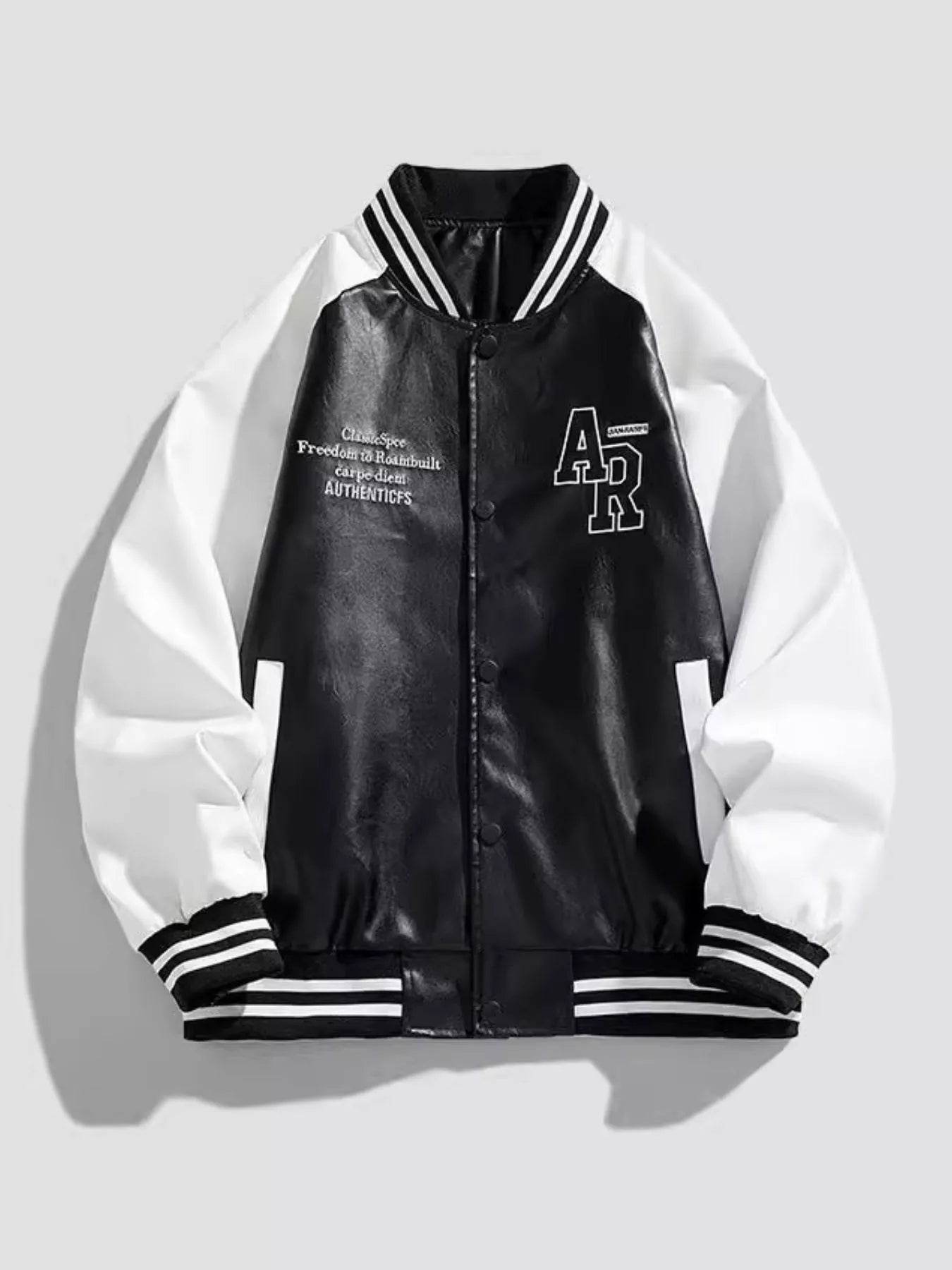 Men's black and white varsity jacket with snap buttons and striped trim