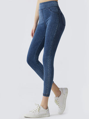 Denim illusion sculpt leggings in medium wash with faux pocket detail and elastic waistband.