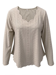 Mocha scalloped eyelet yoke blouse with long sleeves and a scalloped hem.
