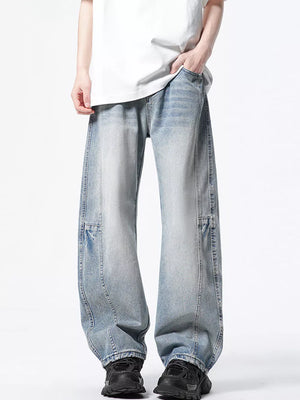 Light wash denim wide-leg jeans with a vintage look and relaxed fit.