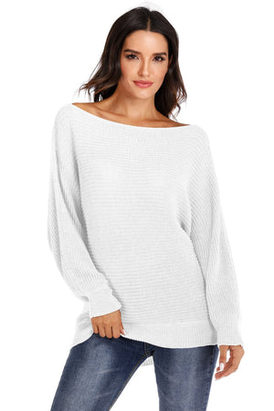 White off-shoulder batwing knit sweater with a relaxed fit and ribbed cuffs.