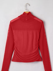 Sheer mesh patchwork high neck long sleeve maternity top in deep red with ruched sides.