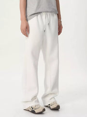 White relaxed fit sweatpants with adjustable drawstring waist
