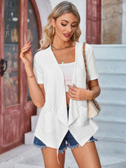 White perforated shawl collar jacket with short sleeves and pockets.